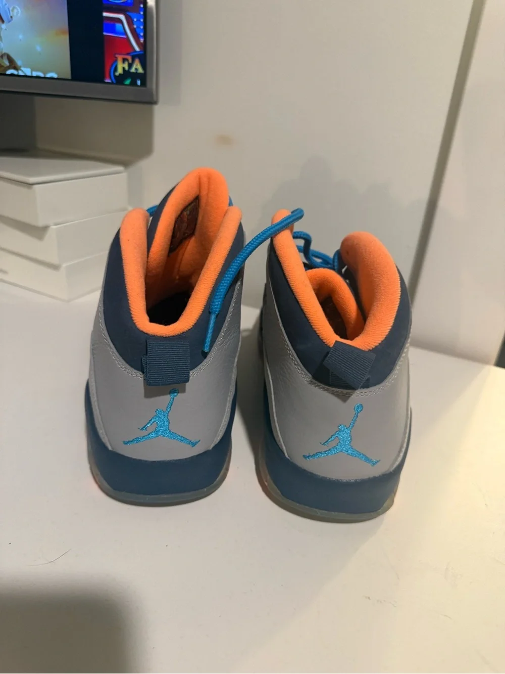 Jordan Men's Gray Sneakers with Blue Laces and Orange Collar